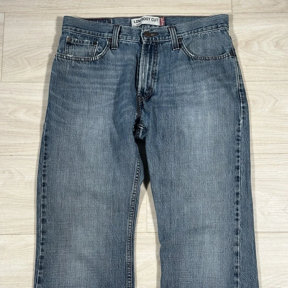 Levi's 527 Slim Bootcut Jeans Mens 34x30 Medium Blue Wash 100% Cotton Distressed